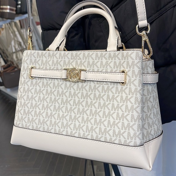 Michael Kors Reed Small Belted Logo Satchel Crossbody Purse 
Light Cream Mlt
NWT - Picture 13 of 16